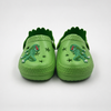 Fabricante al por mayor de los zapatos de jardín de EVA de los zuecos de los niños del dinosaurio verde