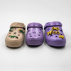 Zuecos de dinosaurios beige para niños al por mayor con dijes de estrellas
