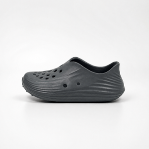 Proveedor al por mayor de zuecos de jardín gris carbón para niños EVA Slip-On