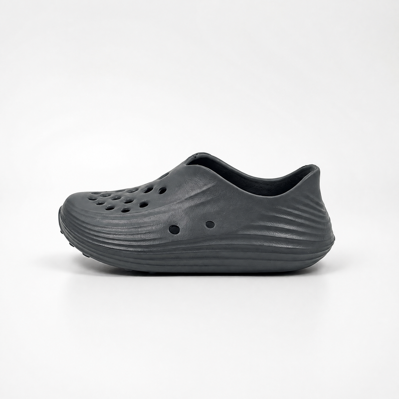 Proveedor al por mayor de zuecos de jardín gris carbón para niños EVA Slip-On