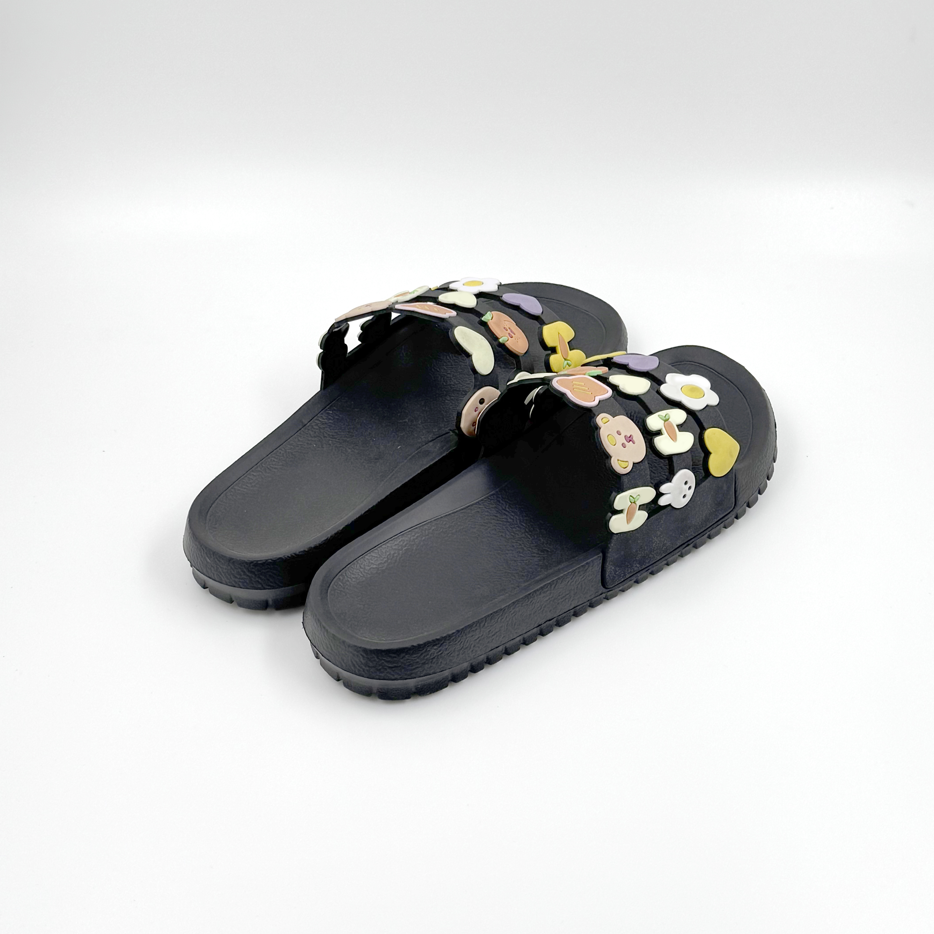 Mujeres zapatillas de flores Sandalias de dibujos animados negros Eva