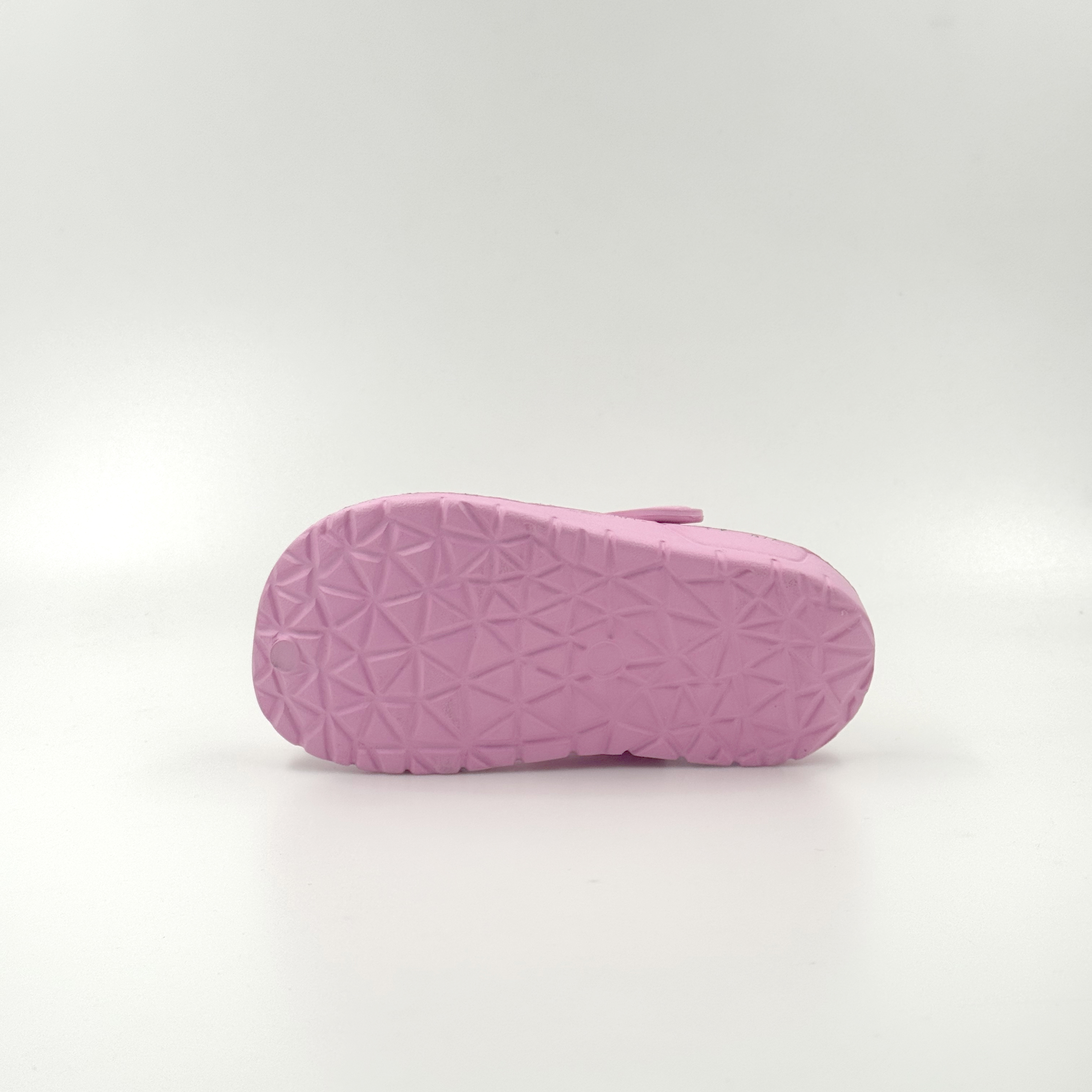 El zueco rosado de la espuma de Eva de los zuecos calza la sandalia a granel de los zuecos