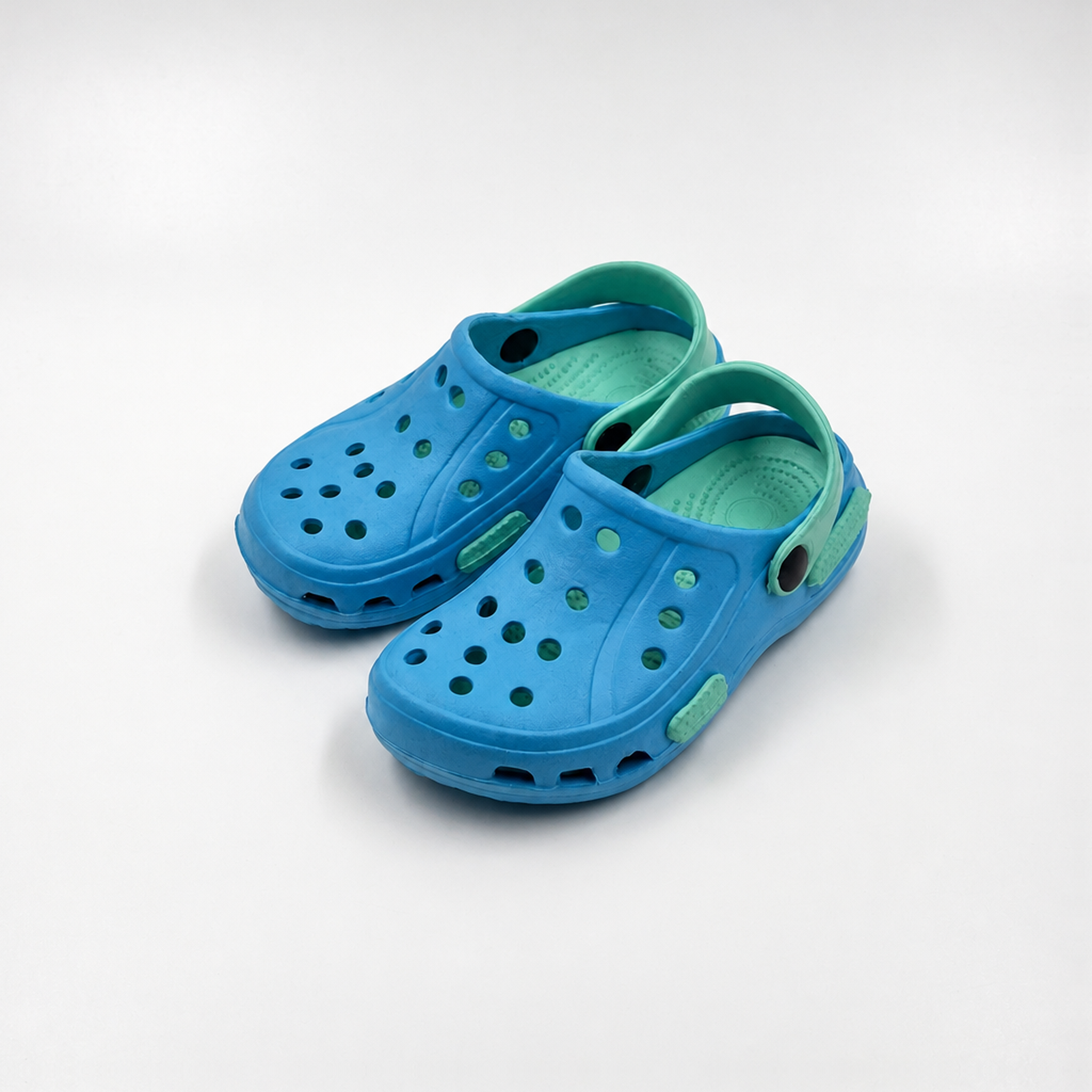 Zuecos de dos tonos para niños al por mayor Zapatos de jardín EVA azules y menta