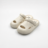 Zuecos minimalistas de EVA color blanco roto para niños de Bulk Zapatos de jardín ligeros