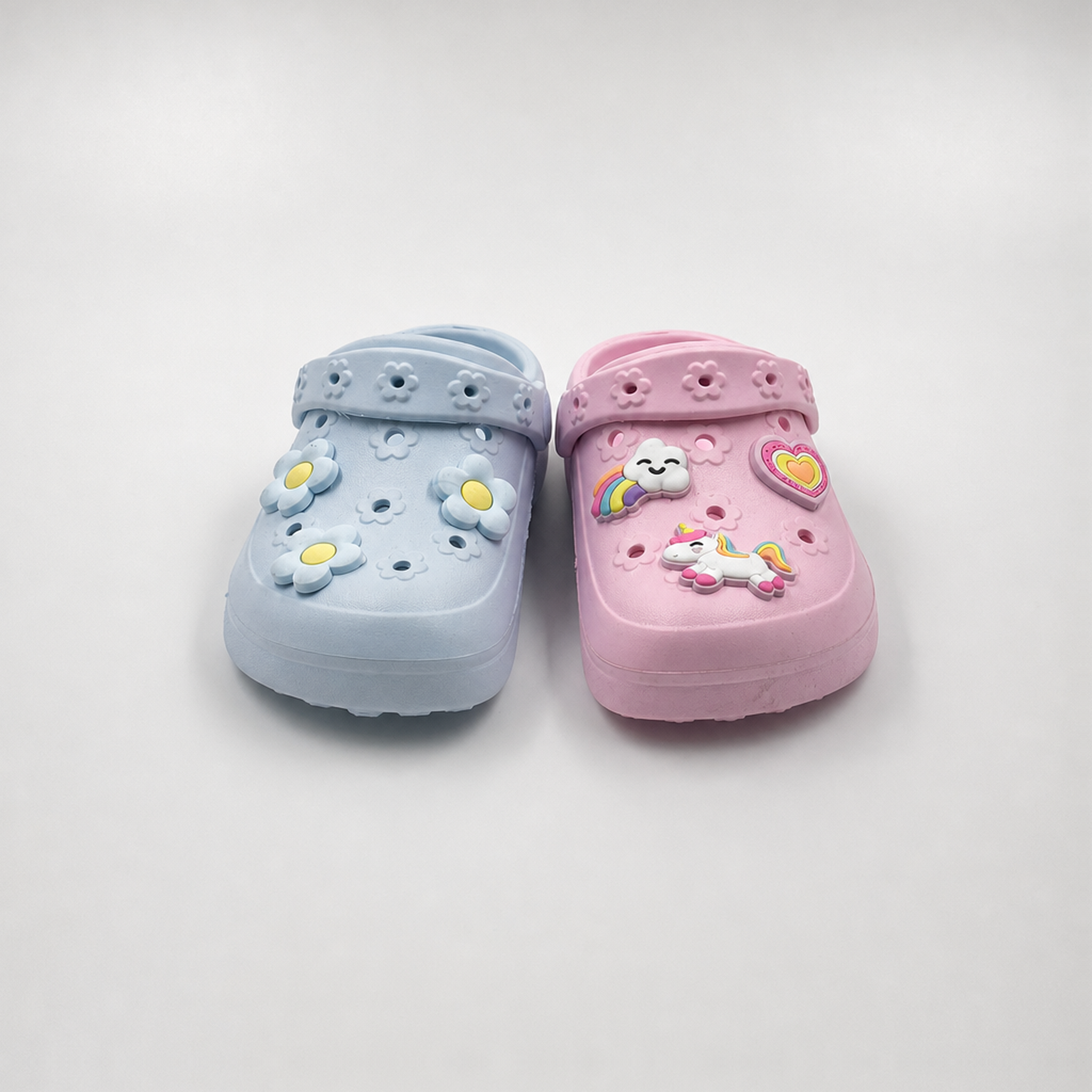 Zuecos de unicornio rosa para niños a granel Zapatos de jardín con tema de arco iris y corazón