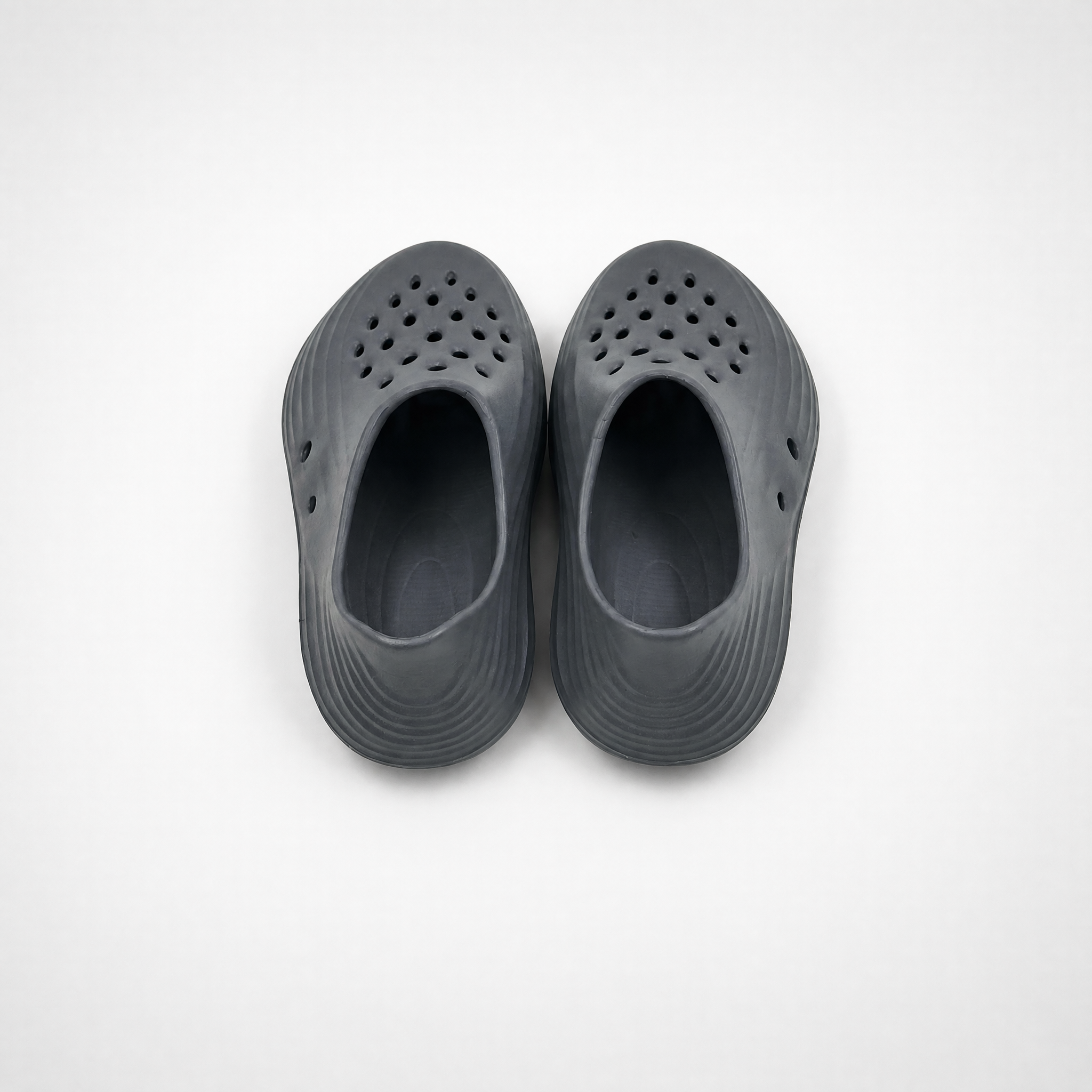 Proveedor al por mayor de zuecos de jardín gris carbón para niños EVA Slip-On