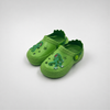 Fabricante al por mayor de los zapatos de jardín de EVA de los zuecos de los niños del dinosaurio verde