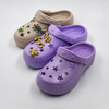 Zuecos de dinosaurios beige para niños al por mayor con dijes de estrellas