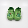 Fabricante al por mayor de los zapatos de jardín de EVA de los zuecos de los niños del dinosaurio verde
